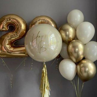 Воздушные шары с большим шаром бежевые и золотые