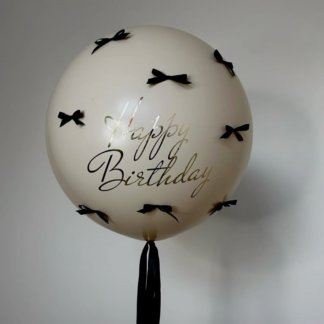 Большой шар бежевый с бантиками и надписью