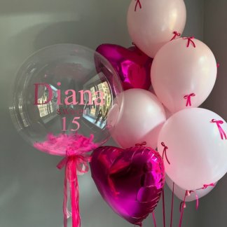 Воздушные шары розовые с бантиками, с шаром с именем